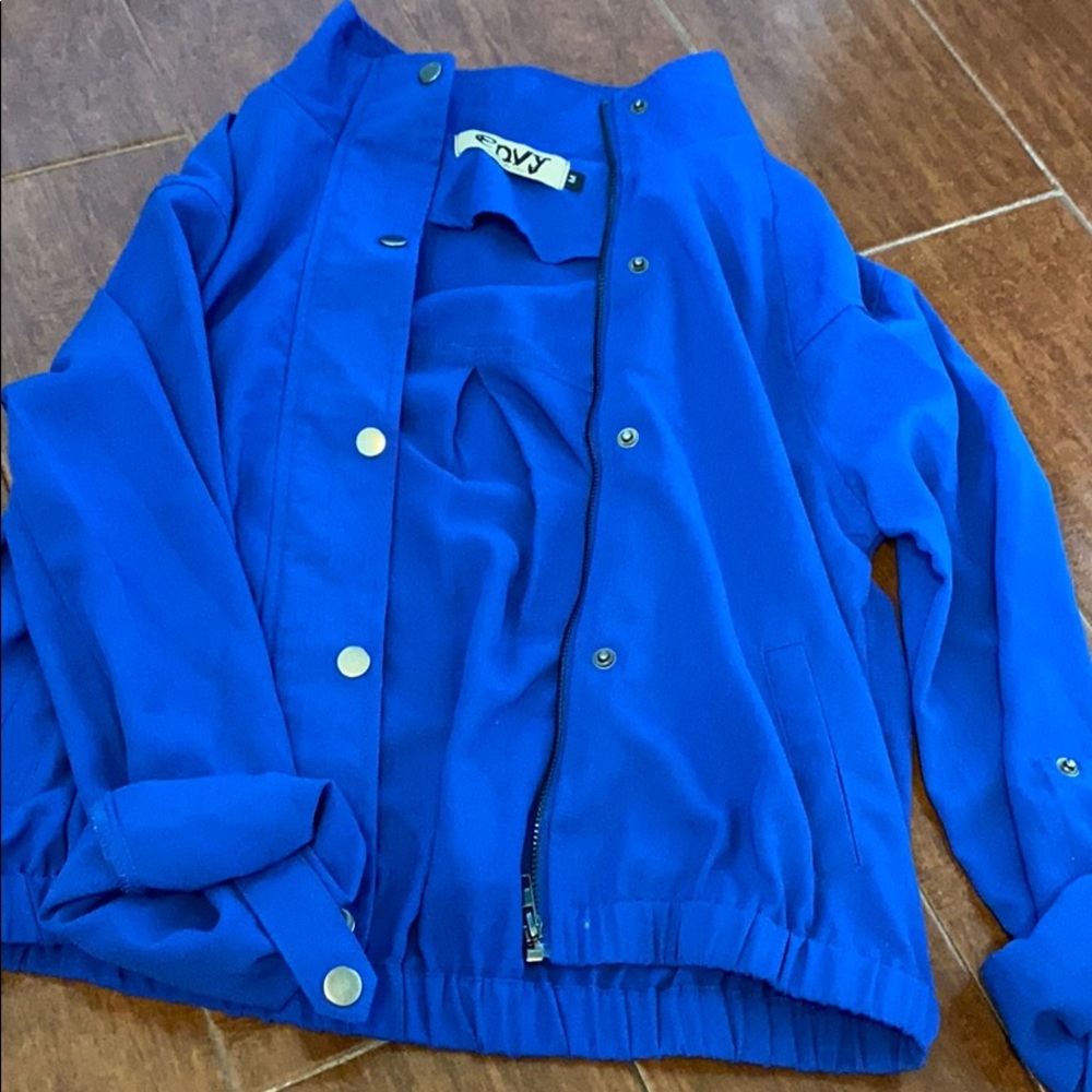 Blue zip up and button up jacket
